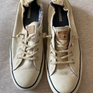 Off white w/ navy trim elastic back slip on Converse all star size 10